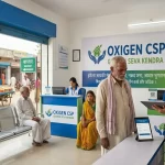 Professional staff member assisting a customer at an Oxigen CSP Grahak Seva Kendra banking center.